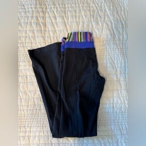 Lululemon Black Groove pants with Blue/multicolor band.